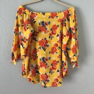 Status floral over the shoulder blouse